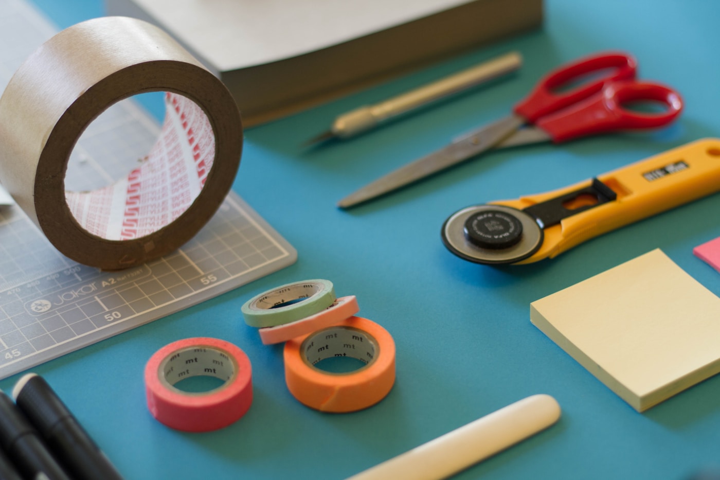 Artisan hands working on leather in a sunlit workshop — ZELVE atelier behind the scenes